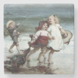 Mädchen spielen als Pferde am Strand Steinuntersetzer