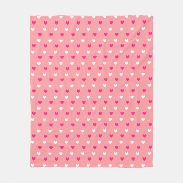 Magenta rote und weiße Herzen auf Korallenrosa Fleecedecke (Vorderseite)