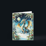 Magische Drachenweihe mit Holly Karte<br><div class="desc">Dieses künstlerische Kunstwerk mit einer Weihnachtskarte und einem zauberhaften Drachen, der anmutig auf einem schneebedeckten Hügel steht, umgeben von wilden und zarten Schneeflocken, die im Winterlicht glitzern. Die Skalen des Drachen schimmern in eisiger Blues und festlichen Grüntönen und harmonieren perfekt mit der Urlaubsszene, während die Augen ein warmes, weises Licht...</div>