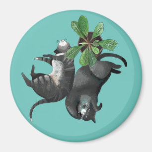 Magnet  Deux chats mentent avec un plante