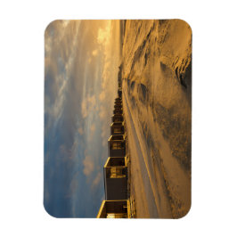 Magnet Flexible Cabines de plage au coucher du soleil sur la côte