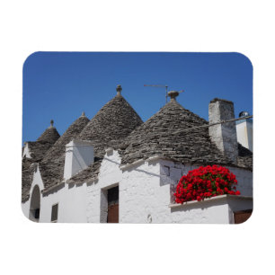 Magnet Flexible Fleurs de géranium et maisons de trulli à Alberobe