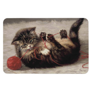 Magnet Flexible Le berceau de chat, un chat qui joue à la balle de