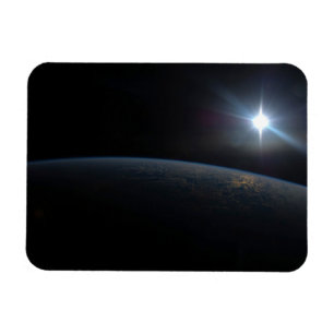 Magnet Flexible Le Soleil qui s'installe sur l'horizon terrestre.