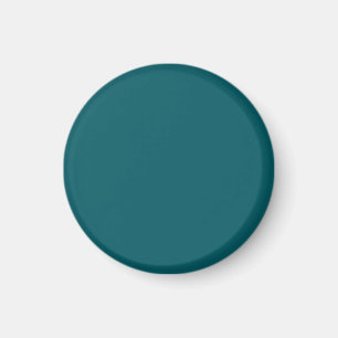 Magnet mit dunklem Aquamarinem Hintergrund
