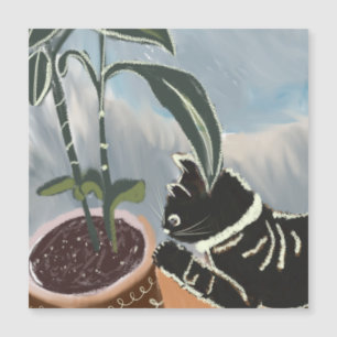 Magnétique Carte de chat regardant les plantes d'intérieur
