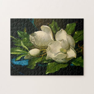 Magnolias géantes sur un puzzle bleu de tissu de