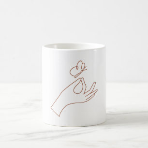 Mains Magiques avec Tasse à Café Papillon