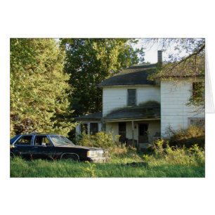 Maison et voiture abandonnées