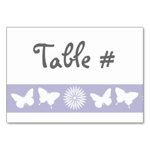 Maisonnettes et papillons dans la carte table Lave