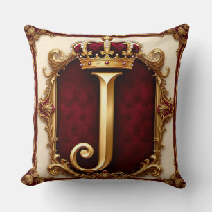 Majestätiges goldenes Monogramm mit Krone auf köni Kissen