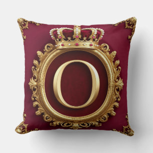 Majestätiges goldenes Monogramm mit Krone auf köni Kissen