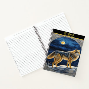 Majestätischer Wolf heult unter dem hellen Vollmon Notizbuch