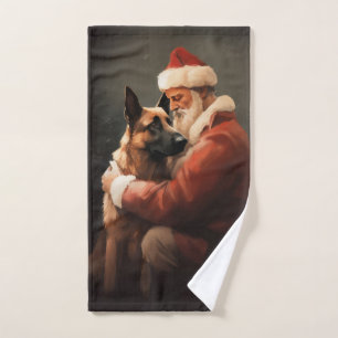 Malinois belge avec le Père Noël festif de Noël