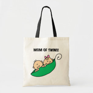Mama von Twins-Erbsen in einem Pod-Hemd und Gesche Tragetasche