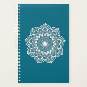 Mandala blanc sur fond bleu