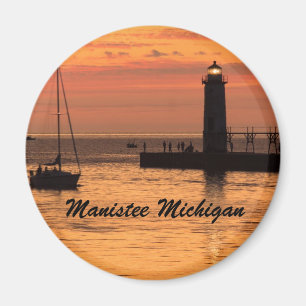 Manistee, aimant de coucher du soleil de phare du