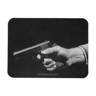 Mann, der Gewehr hält Magnet