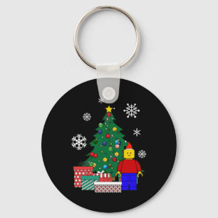 Mann um das Weihnachtsbaum T-Shirt  Schlüsselanhänger