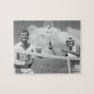 Mann und Frau beim Tennisspielen