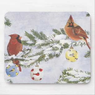 Männliche und weibliche Kardinäle genießen einen Mousepad