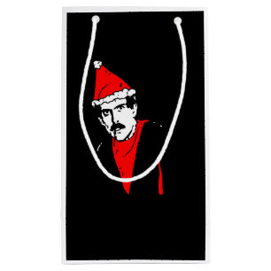 Manos bringt kleine Vorlagengeschenk-Tasche zurück Kleine Geschenktüte