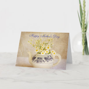 Marguerites sur une carte de fête des mères de thé