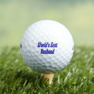 Mari avec balles de golf en texte bleu