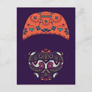 masqué sur une carte postale à motifs paisley