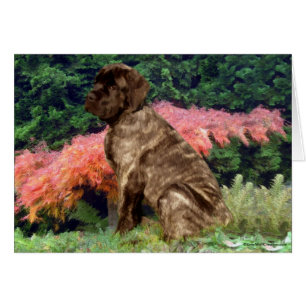 Mastiff Welpe in Sträuchern