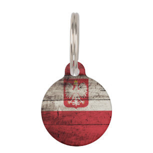Médaillon Pour Animaux Drapeau de la Pologne sur le vieux grain en bois