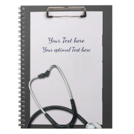 Medizinische Grauklammer mit Stethoskop Notizblock