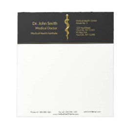 Medizinstudium des Asclepius Gold auf schwarz Notizblock