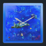 MeeresschildkrötenWIND AUF DEM WASSER Quadratische Wanduhr<br><div class="desc">Eine ruhige und blühende Gegend mit tiefblauem Meer, in der Delphine in den Wellen über und unter mit der Gänseschildkröte und seinen kleinen tropischen Fischliebhabern ausbrechen.</div>