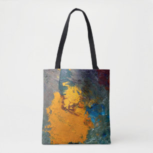 mehrfarbige Linien der Ölfarbe auf den Künstlern Tasche