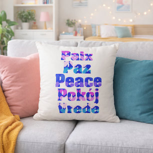Mehrsprachige Friedens-Typografie mit pastellfarbe Kissen