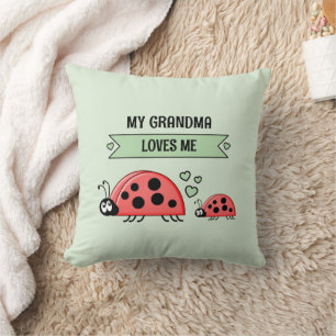 Meine Oma liebt mich Marienkäfer grün Baby Kissen