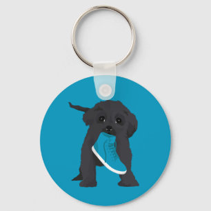 Melodie der Affenpinscher-Welpe, der Schuh stiehlt Schlüsselanhänger
