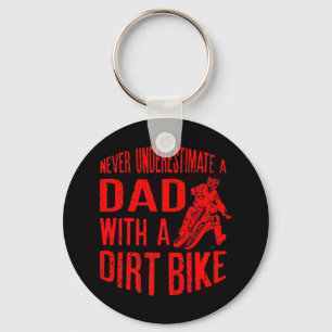 Mens unterschätzen nie einen Vater mit einem Dirt- Schlüsselanhänger