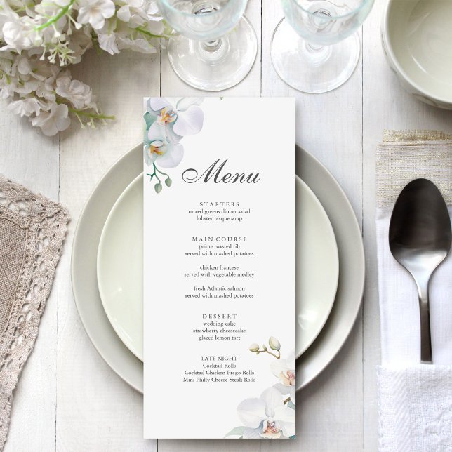 Menu Mariage d'orchidée sauvage moderne et élégant (Modern Elegant Wild Orchid Wedding Menu on a beautiful white and silver wedding dinner table.)