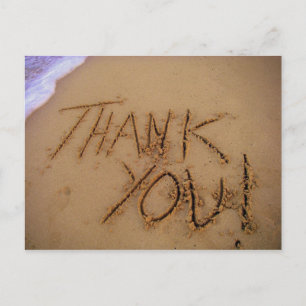 Merci dans carte postale de sable