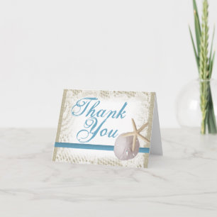 Merci du dollar et d'étoiles de mer de sable