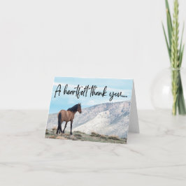 Merci sauvage à cheval