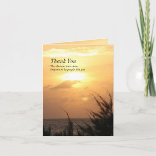 Merci tranquille de coucher du soleil de bord de