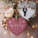 Merrily Ever After | First Married Christmas Photo Keramik Ornament<br><div class="desc">Personalize this festive red holiday ornament with your names and the year for a chic way to commemorate your first married Christmas! Perfect for newlyweds, this heart shaped design features "merrily ever after" in a mix of white calligraphy script and block typefaces, accented with white snowflakes. Add your favorite wedding...</div>