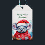 Merry Aussie Christmas Koala Geschenkanhänger<br><div class="desc">Eine sehr frohe Aussie Weihnachten mit dieser niedlichen koala Diese furry koala ist ein gebürtiger Australier sie sind leicht erkennbar durch ihren stinkenden,  taillen Körper und großen Kopf mit runden,  flauschigen Ohren und große,  löffelförmige Nase.</div>