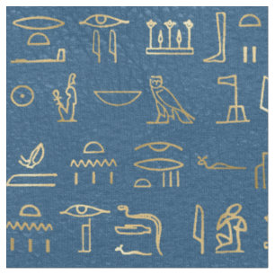 Metallische ägyptische Hieroglyphen auf blau Stoff