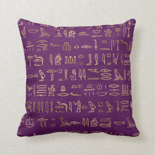 Metallische ägyptische Hieroglyphen auf Lila Kissen