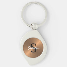 Metallische Bronze-Gold aus elegantem Monogramm