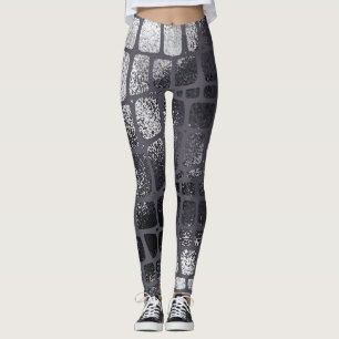 Metallische schwarze Schlangenhaut: Elegante Textu Leggings